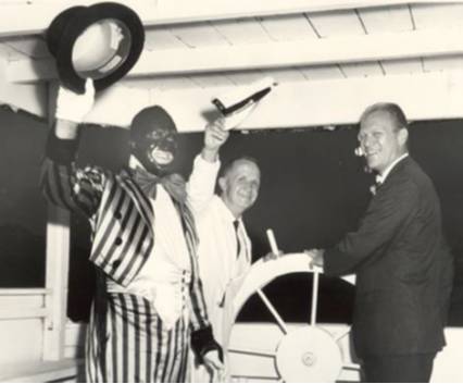 Then-Congressman and future President Gerald Ford aboard the Lowell Showboat, standing next to a blackface performer.